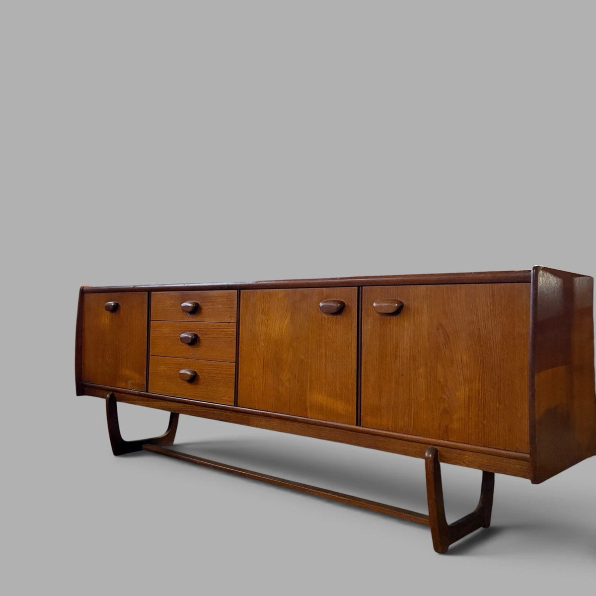 Mid Century Portwood Teak Long Sideboard with Sculptural Sleigh Legs - view 6