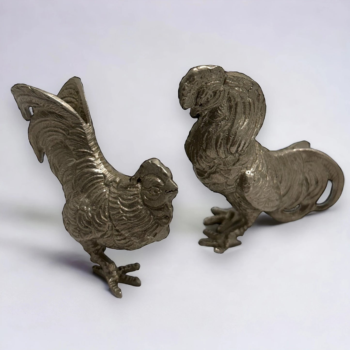 Mid Century Silver Fighting Roosters Sculptures