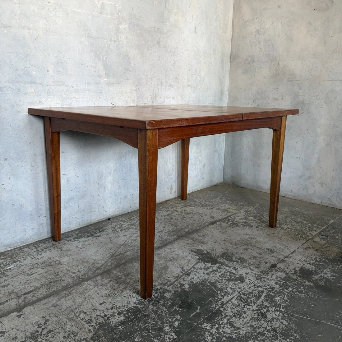 Compact mid-century teak extending dining table for a London flat