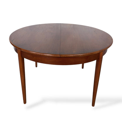Mid Century Elliotts of Newbury Extending Teak Dining Table Round to Oval Butterfly Leaf Table