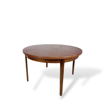 Afromosia Teak Round Extending Dining Table with Tapered Legs — view 8