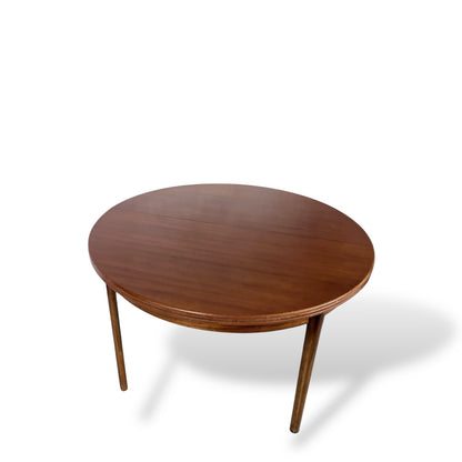 Afromosia Teak Round Extending Dining Table with Tapered Legs — view 7