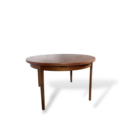 Afromosia Teak Round Extending Dining Table with Tapered Legs — view 6
