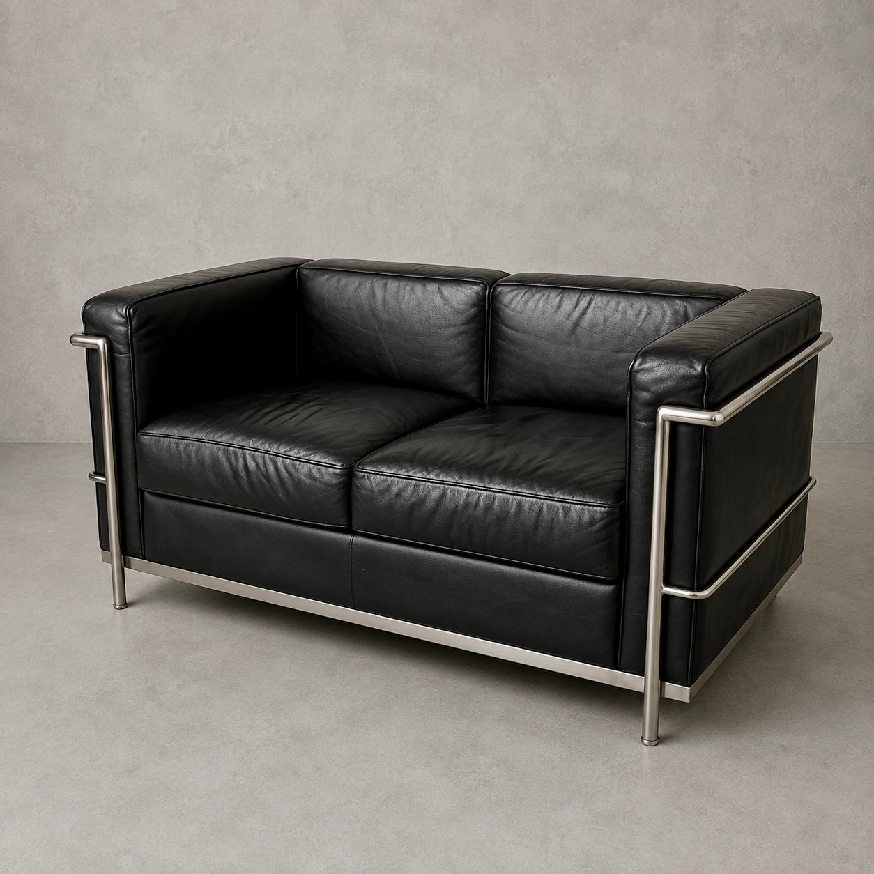 Mid Century Black Leather & Chrome Two Seater Sofa | Le Corbusier LC2 Style