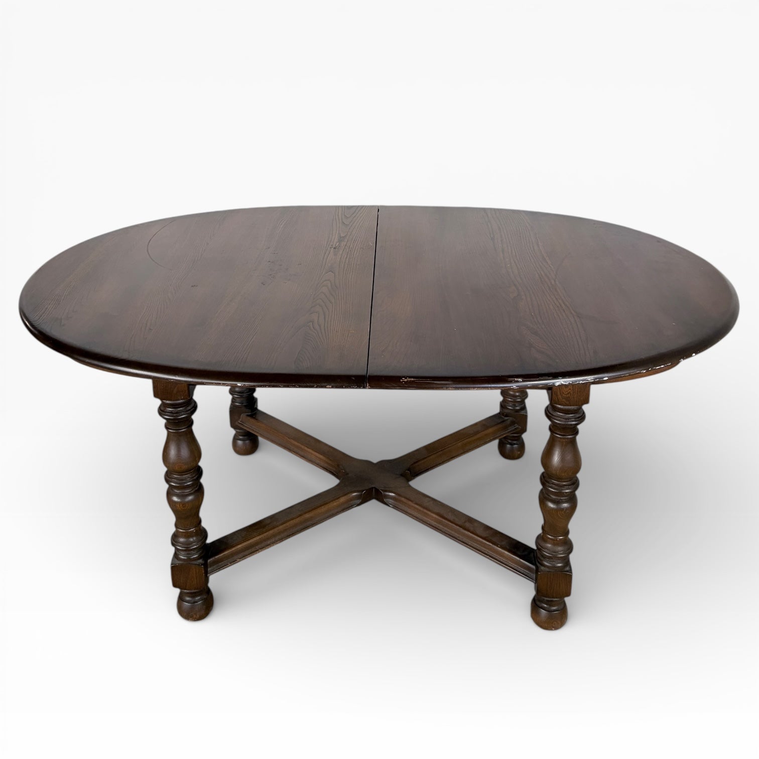 Ercol Dark Elm Oval Extending Dining Table