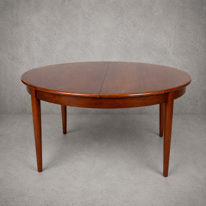 Mid Century Elliotts of Newbury Extending Teak Dining Table Round to Oval Butterfly Leaf Table