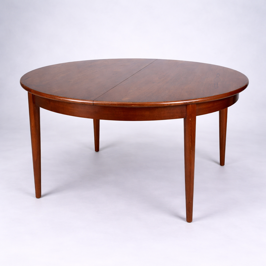 Mid Century Elliotts of Newbury Extending Teak Dining Table Round to Oval Butterfly Leaf Table