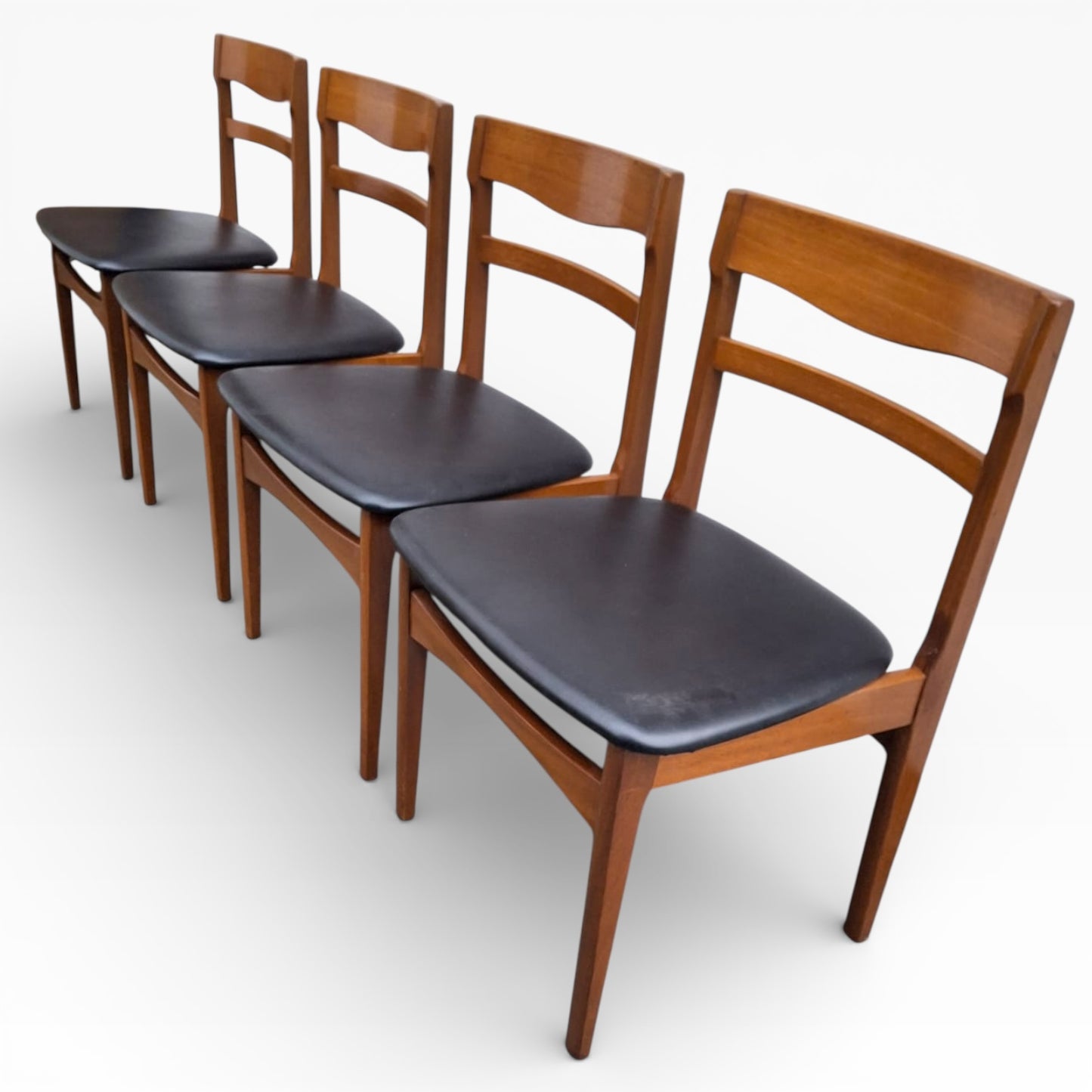 Nathan Teak Dining Chairs with Black Vinyl Seats – Set of Four