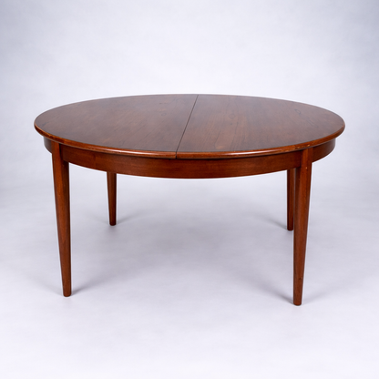 Mid Century Elliotts of Newbury Extending Teak Dining Table Round to Oval Butterfly Leaf Table