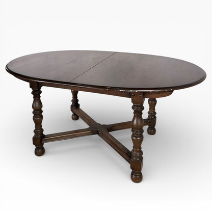 Ercol Dark Elm Oval Extending Dining Table — view 4