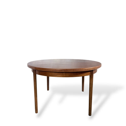 Afromosia Teak Round Extending Dining Table with Tapered Legs — view 4