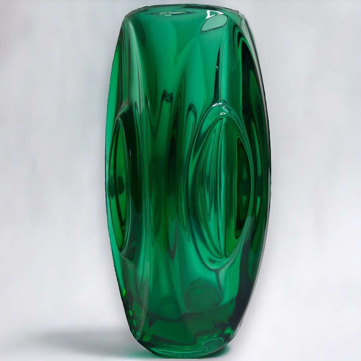 Mid century dark green glass bullet vase