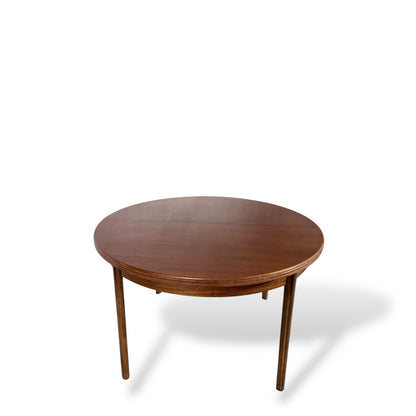 Afromosia Teak Round Extending Dining Table with Tapered Legs — view 5