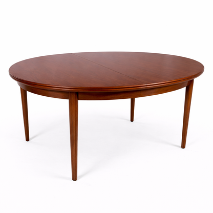 Afromosia Teak Round Extending Dining Table with Tapered Legs — view 2