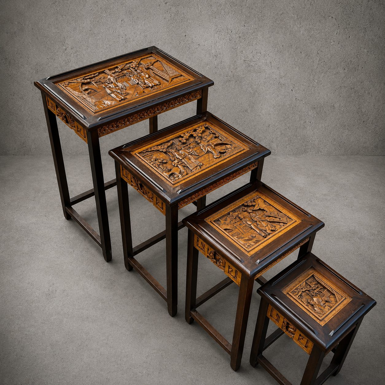 Antique Chinese Camphor Wood Carved Nest of Four Tables