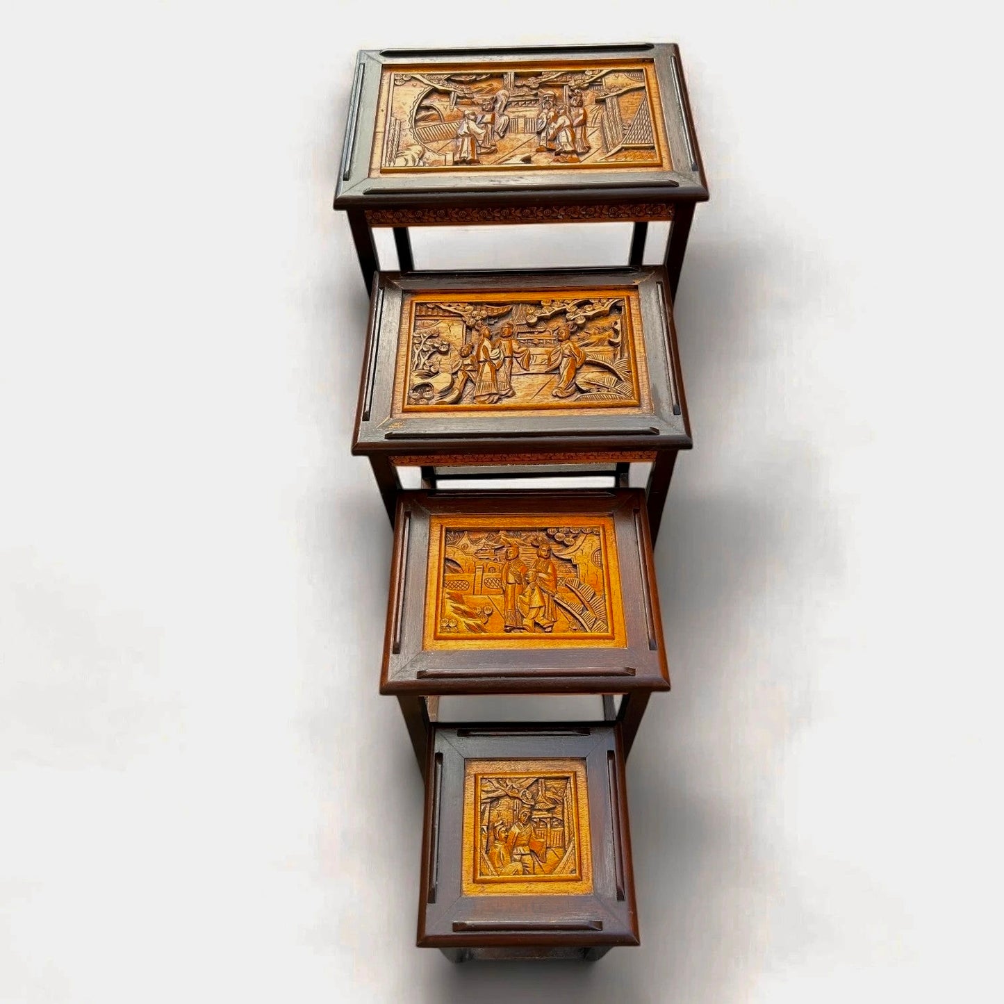 Antique Chinese Camphor Wood Carved Nest of Four Tables