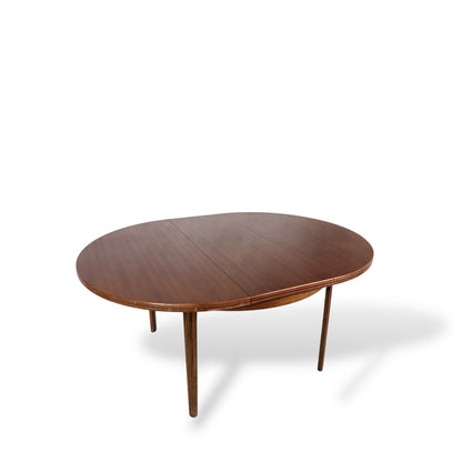 Afromosia Teak Round Extending Dining Table with Tapered Legs — view 10