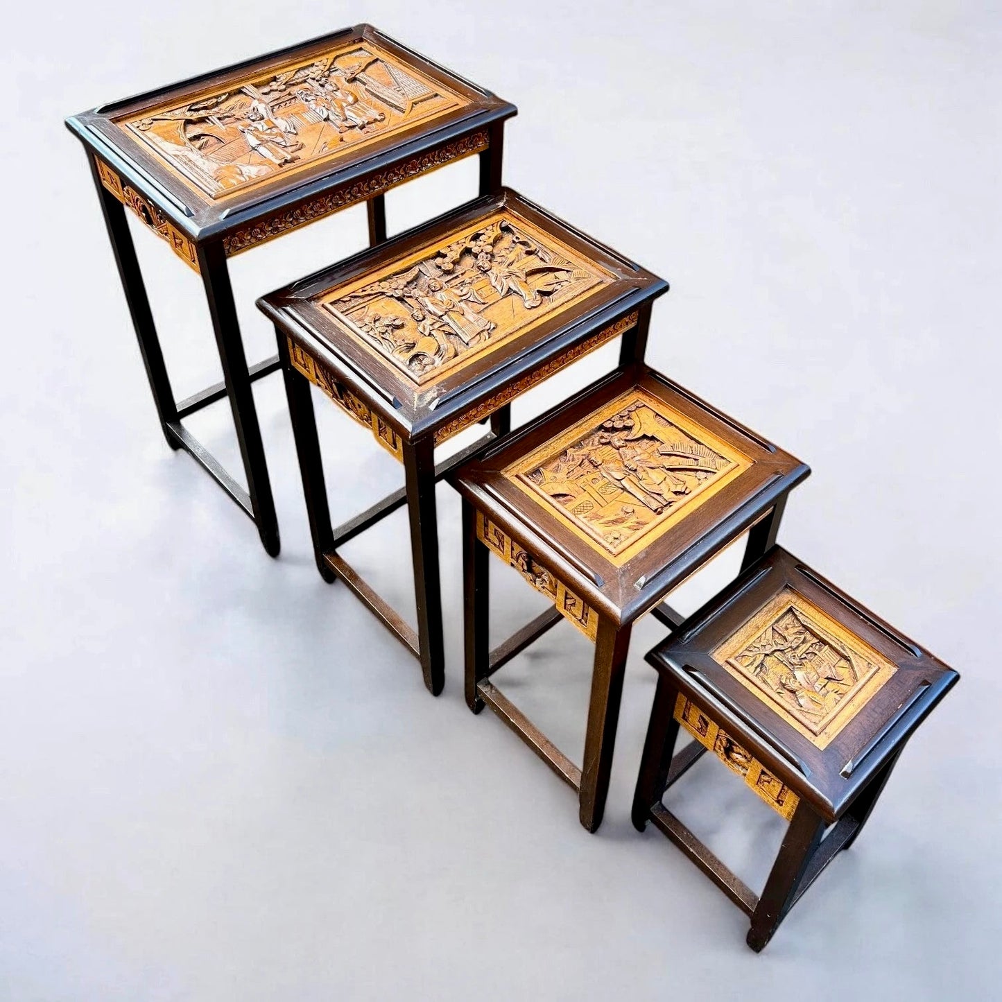 Antique Chinese Camphor Wood Carved Nest of Four Tables