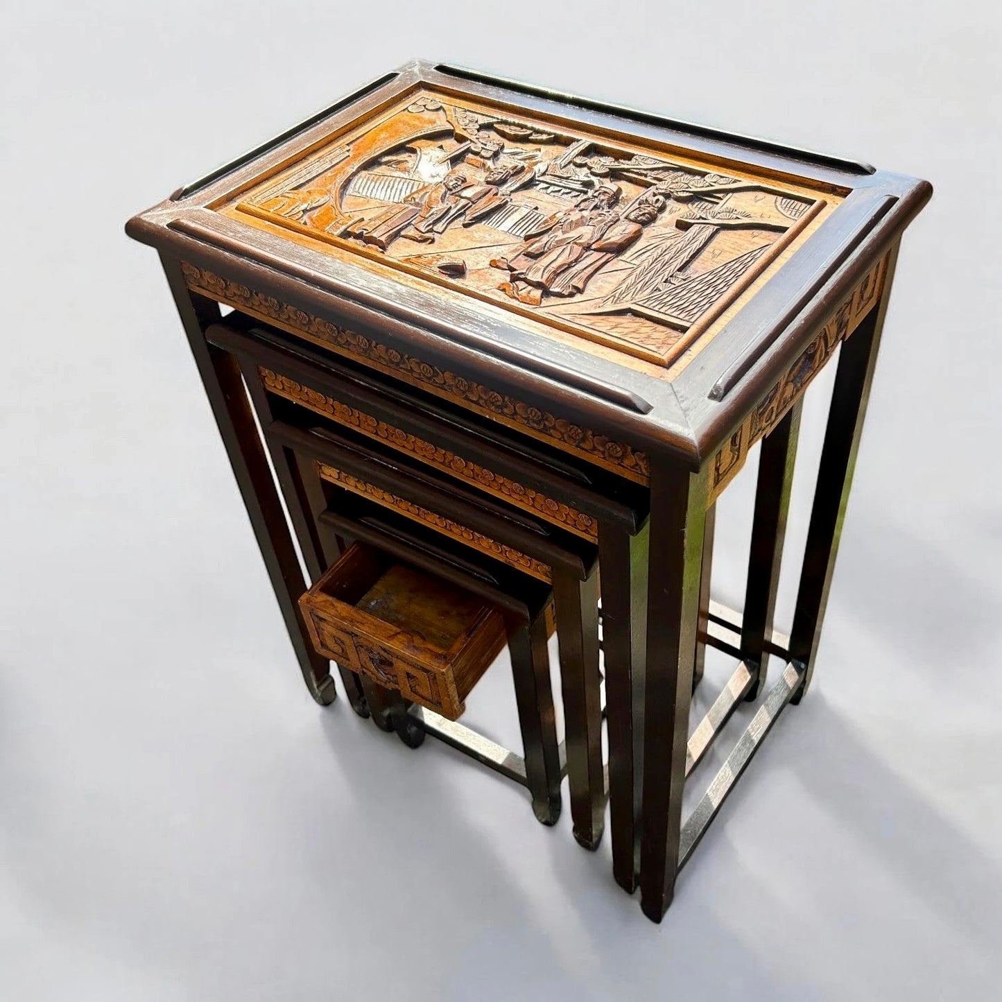 Antique Chinese Camphor Wood Carved Nest of Four Tables