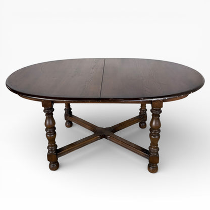 Ercol Dark Elm Oval Extending Dining Table — view 3