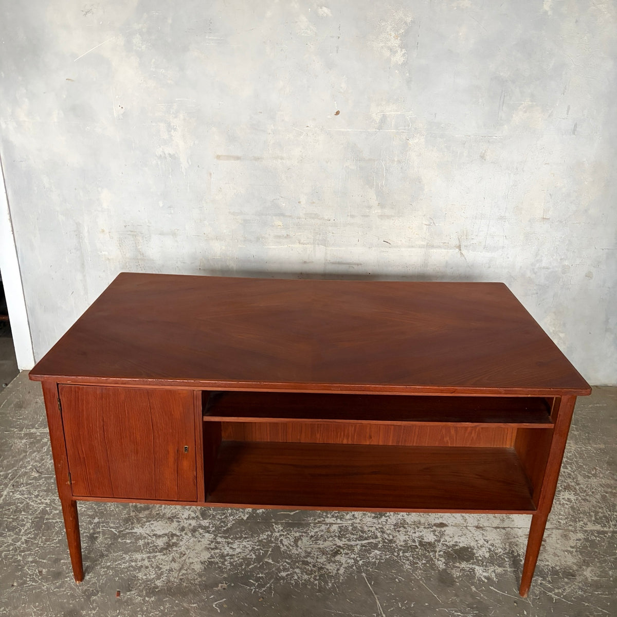 Rear and desktop view of mid-century Danish teak executive desk