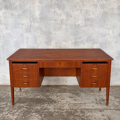 Mid-century Danish teak twin pedestal executive desk, front view