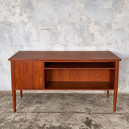 Finished rear of Danish teak executive desk with cupboard and shelves