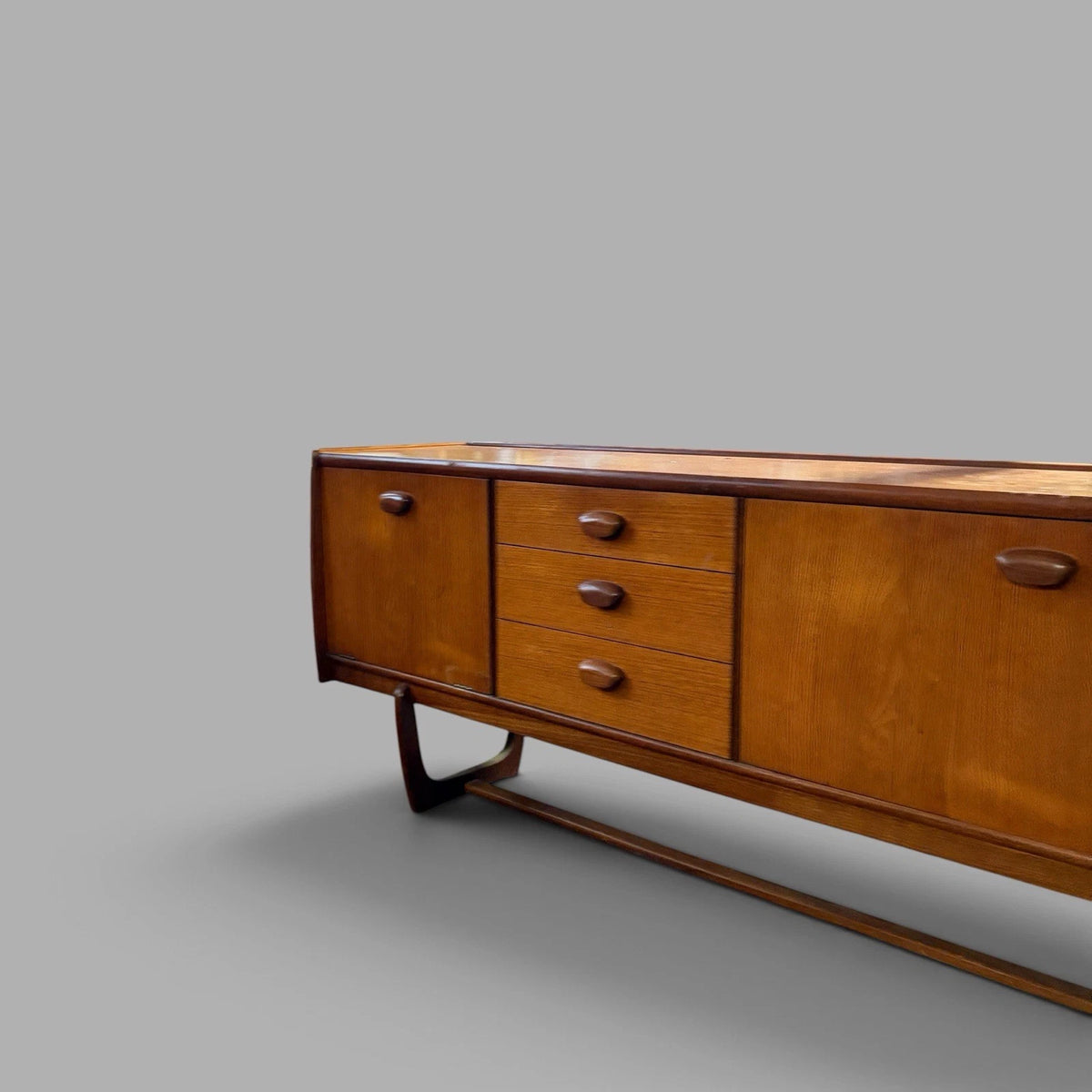 Mid Century Portwood Teak Long Sideboard with Sculptural Sleigh Legs - view 5