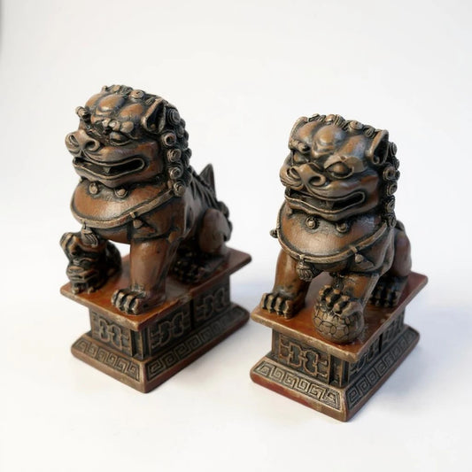 Vintage 1980s Pair of Burgundy Resin Chinese Foo Dog Statues