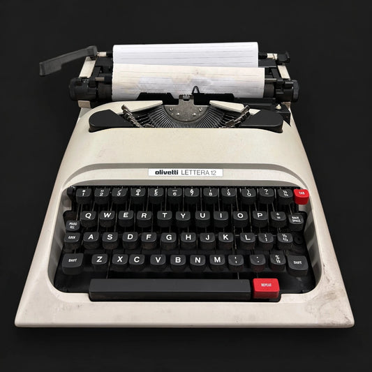 Vintage 1970s Olivetti Lettera 12 portable typewriter