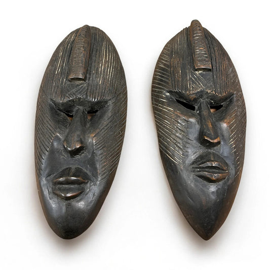 Vintage 1960s pair of African carved wood masks
