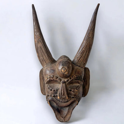 Vintage 1960s carved wood demon wall mask