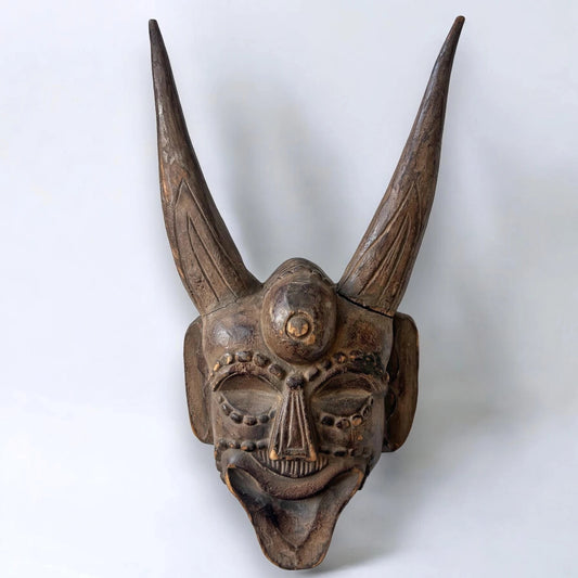 Vintage 1960s carved wood demon wall mask