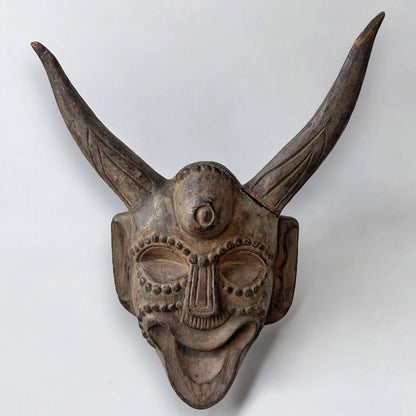 Vintage carved wood demon wall mask