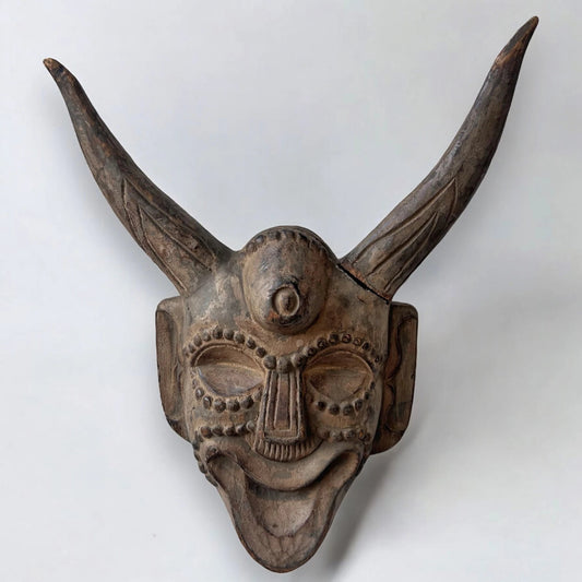 Vintage carved wood demon wall mask