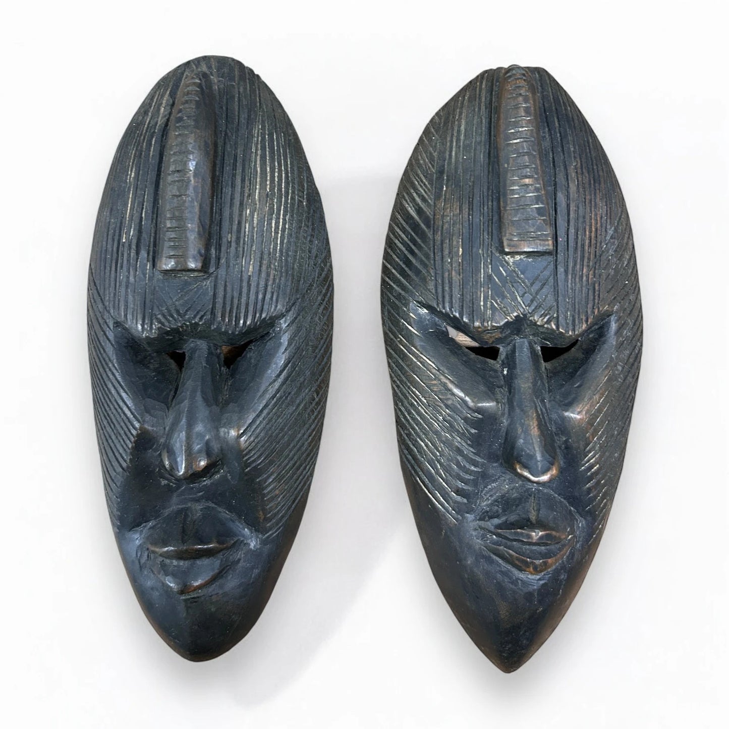 Vintage 1960s pair of African carved wood masks