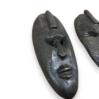 Vintage 1960s pair of African carved wood masks