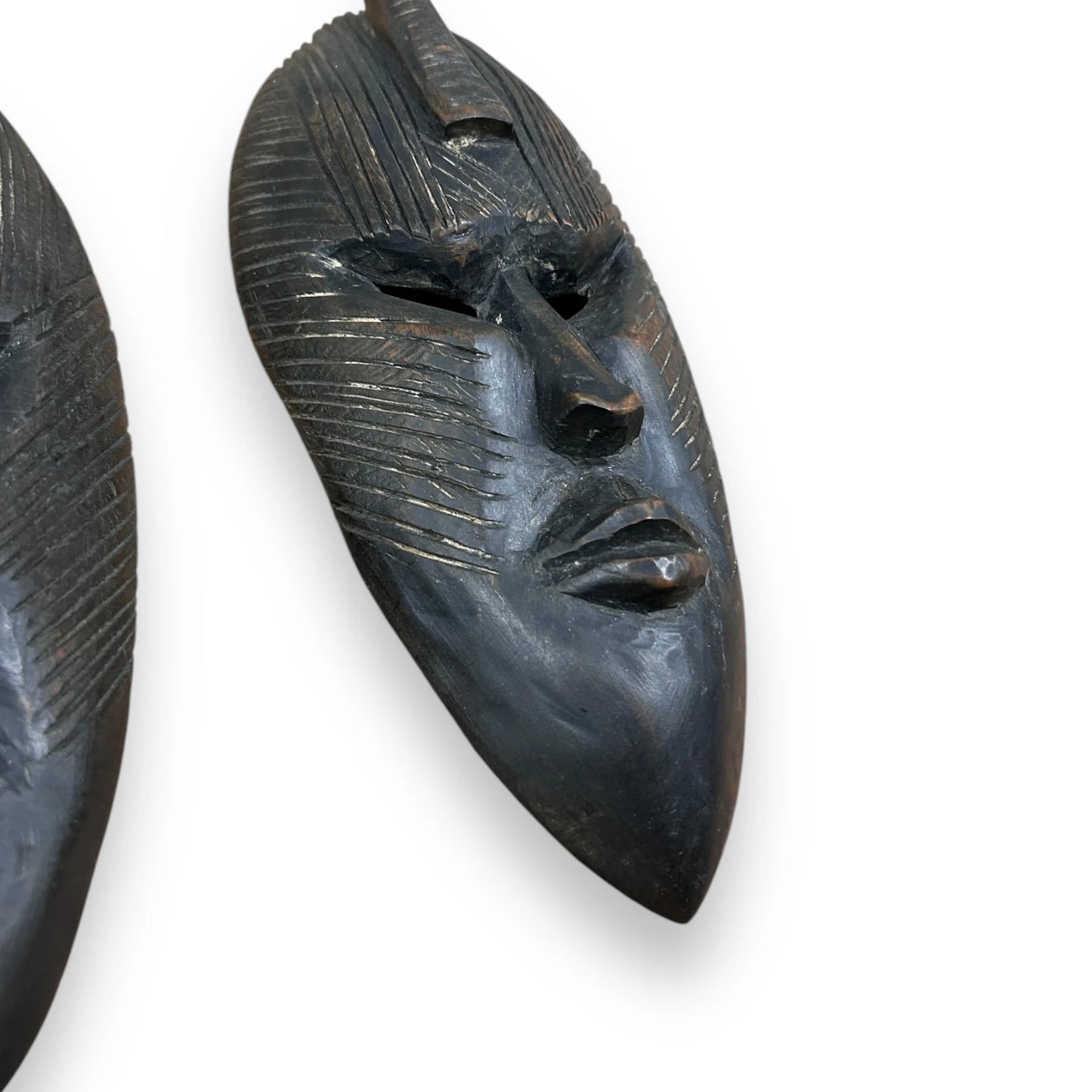 Vintage 1960s pair of African carved wood masks