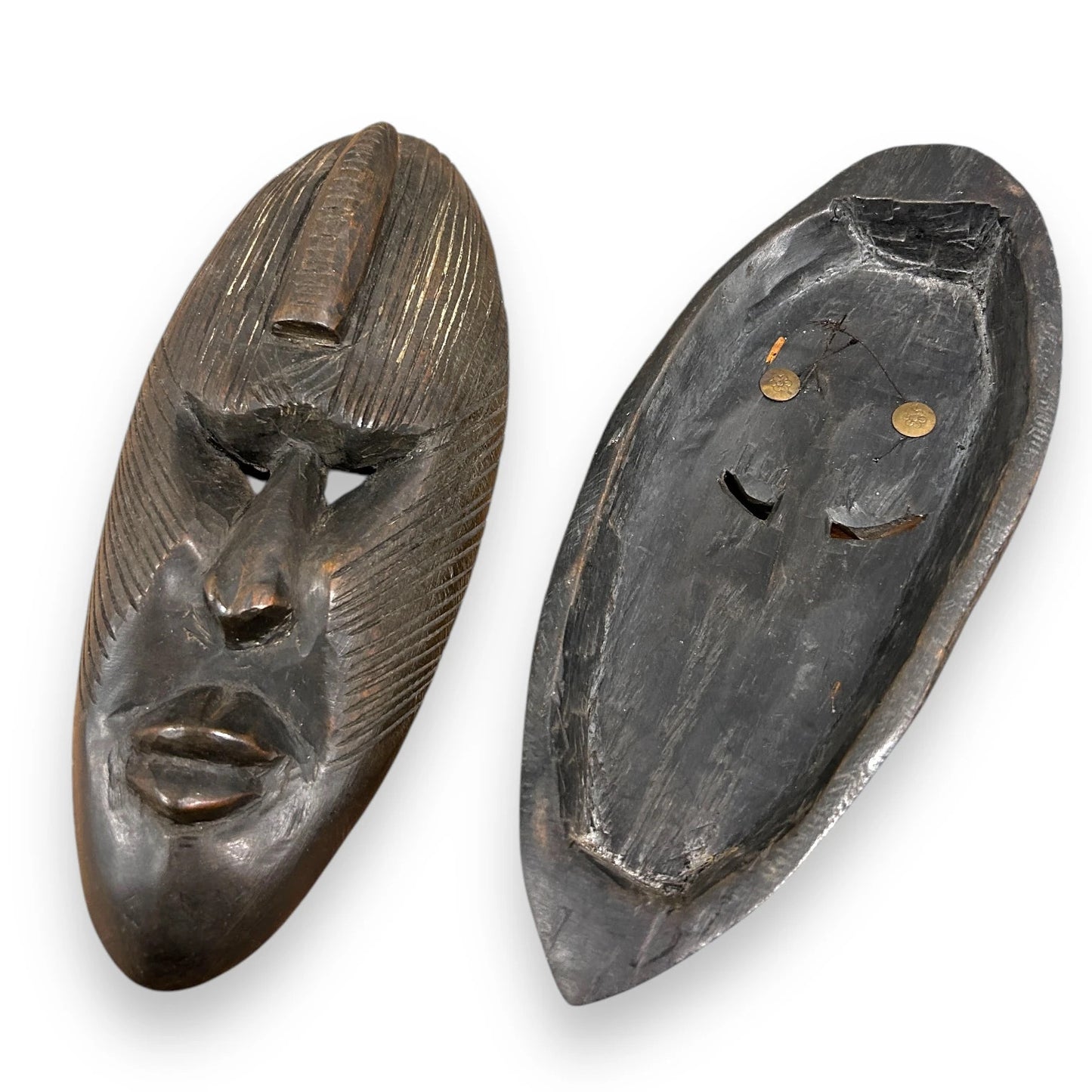 Vintage 1960s pair of African carved wood masks
