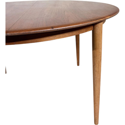 Extending Teak Dining Table – Mid Century Oval Round Leaf by Kai Kristiansen