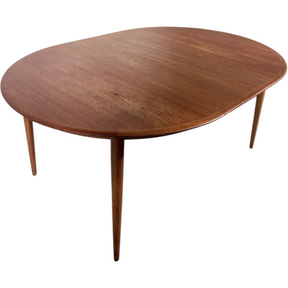 Extending Teak Dining Table – Mid Century Oval Round Leaf by Kai Kristiansen