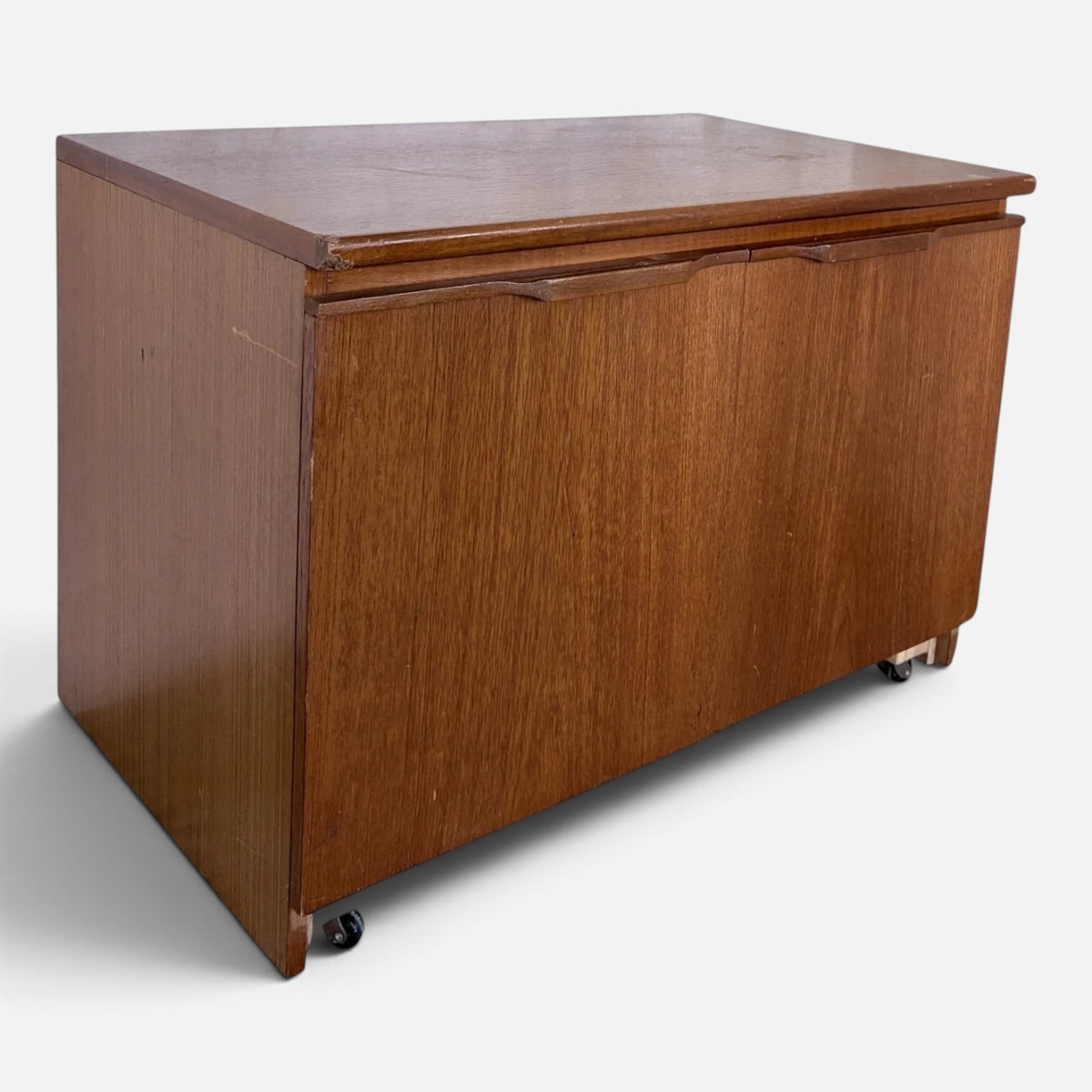 Mid-century teak two-door storage cabinet on castors – photograph 5