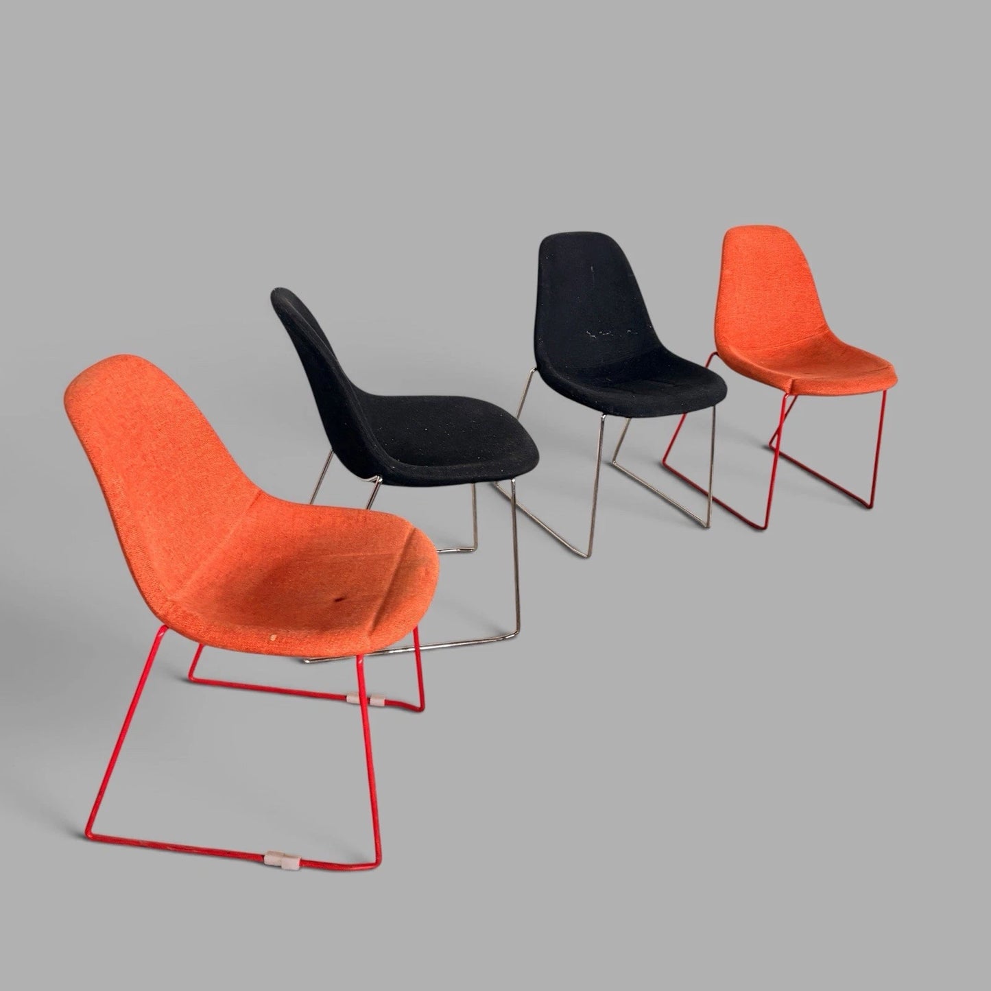 Set of four orange and black stackable egg dining chairs - view 3