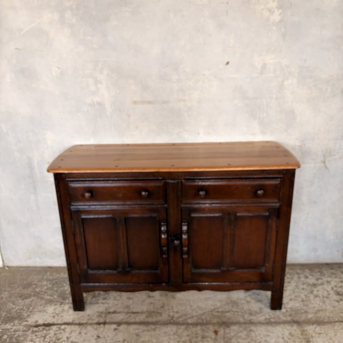 Ercol Old Colonial Elm-Top Sideboard – Two Drawers & Cupboard – view 11