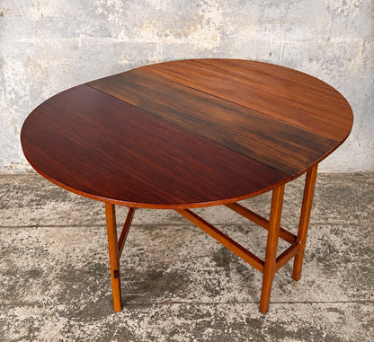 Mid Century Distressed Teak Oval Drop-Leaf Dining Table – 147 × 114 cm – view 1