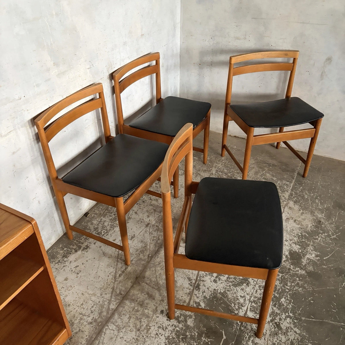 Set of four mid-century teak and beech dining chairs with black vinyl seats – view 5