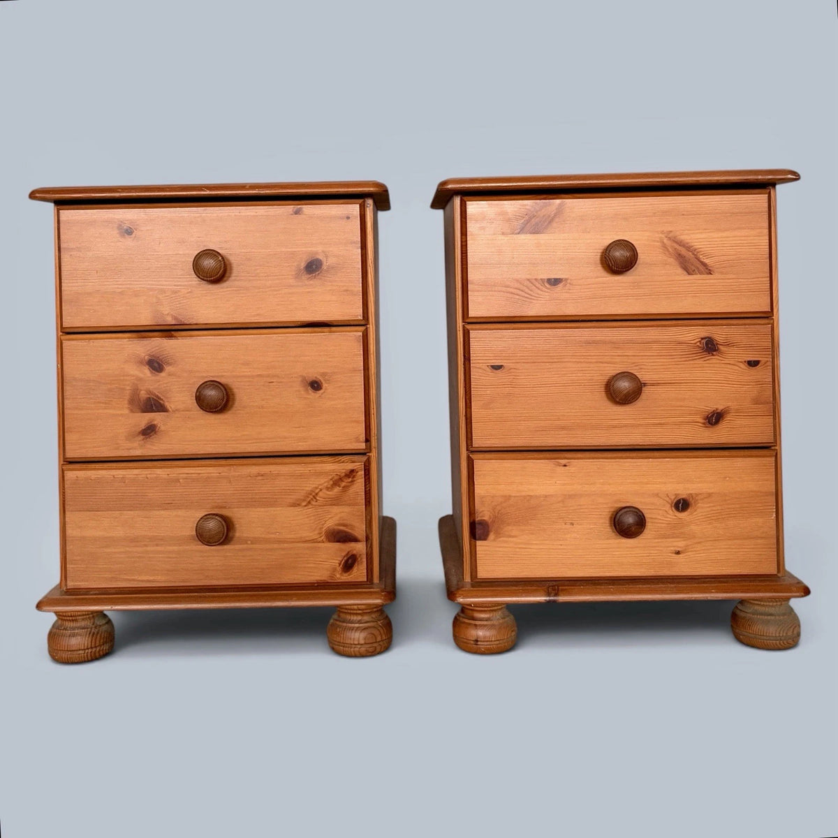 Pair of traditional pine three-drawer bedside cabinets - view 2