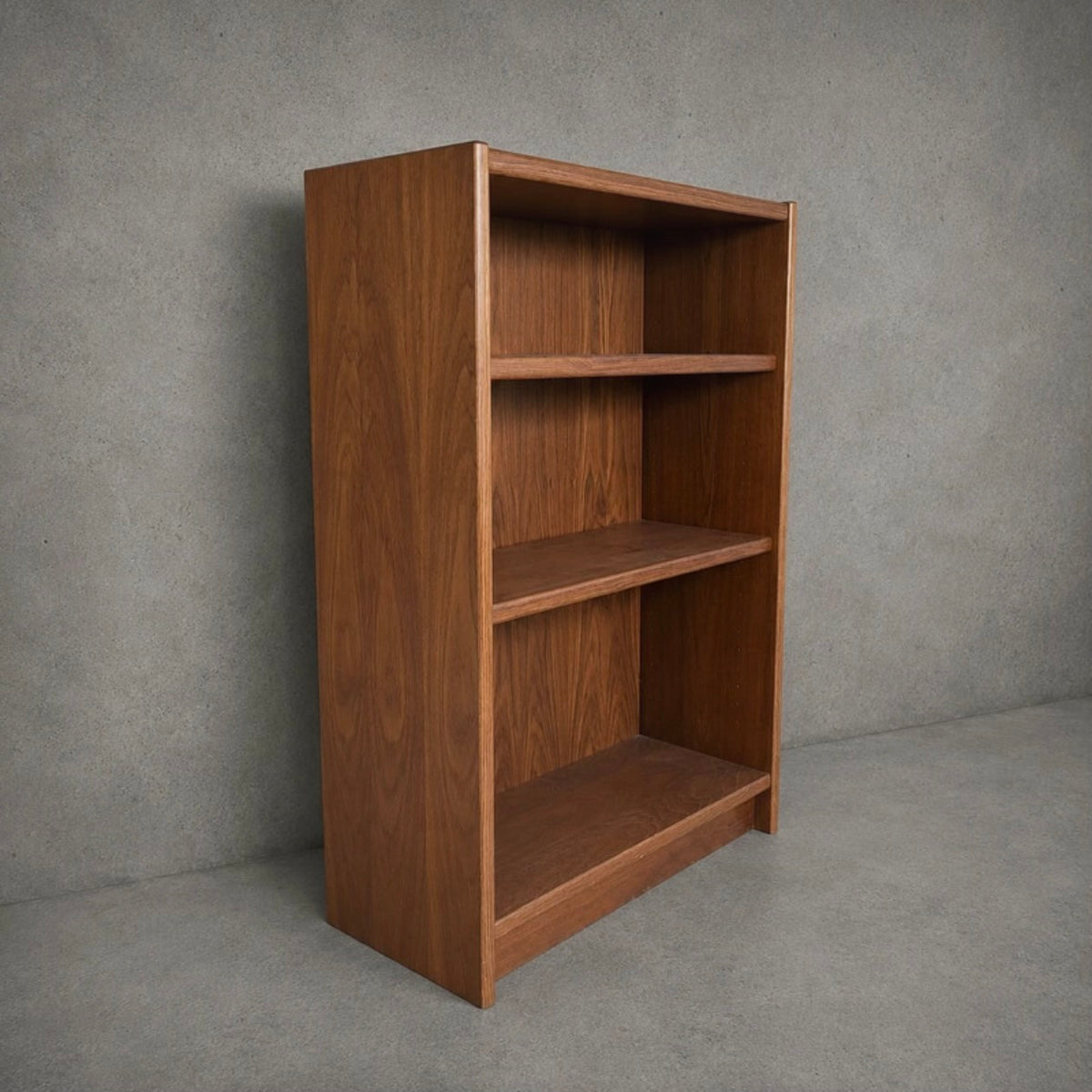 Vintage teak open bookcase with mid-century styling